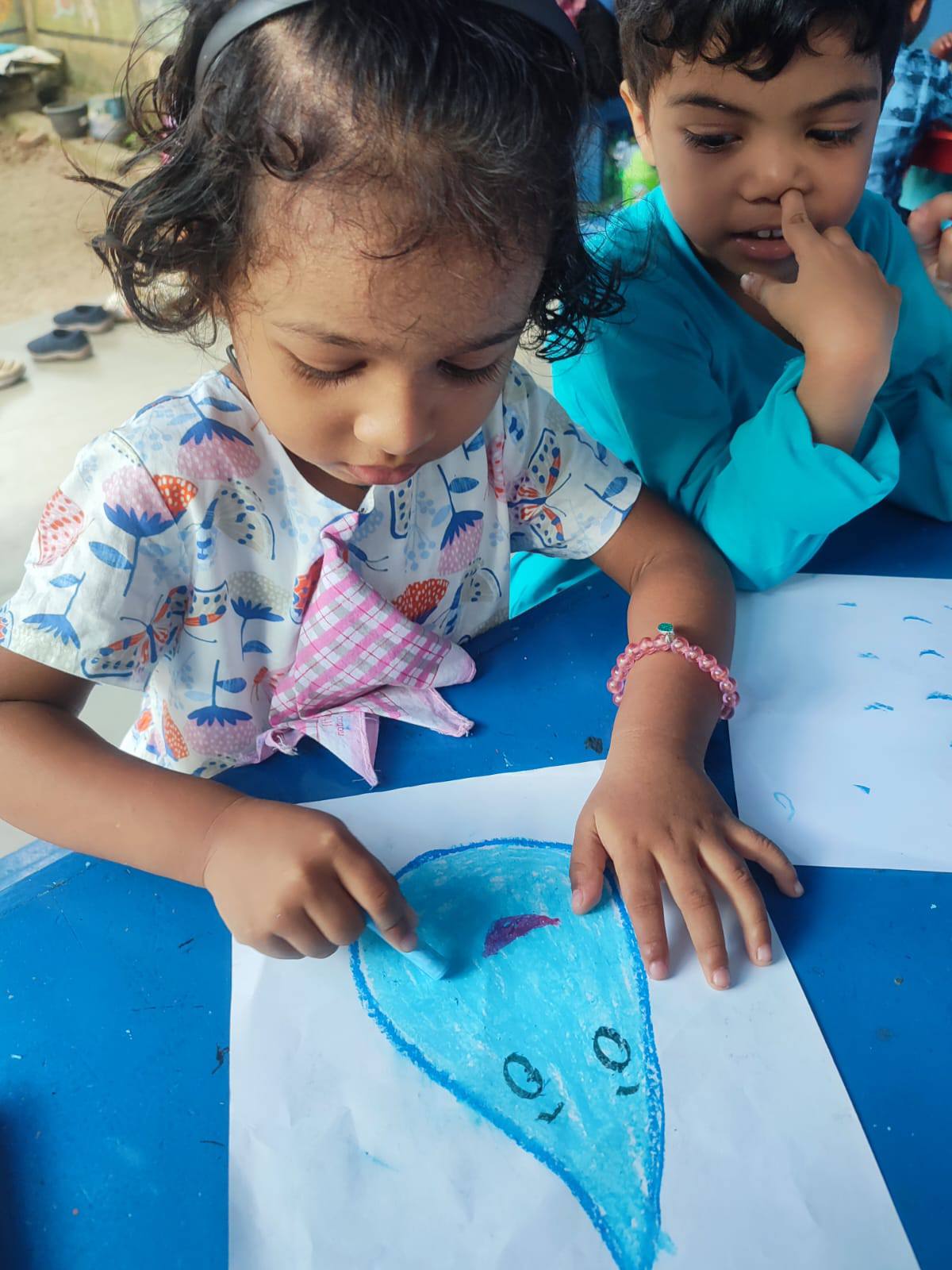 Children playing with paint